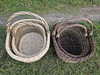 Zwei Korbsets von oben im Gras, jeweils der kleine Korb im großen