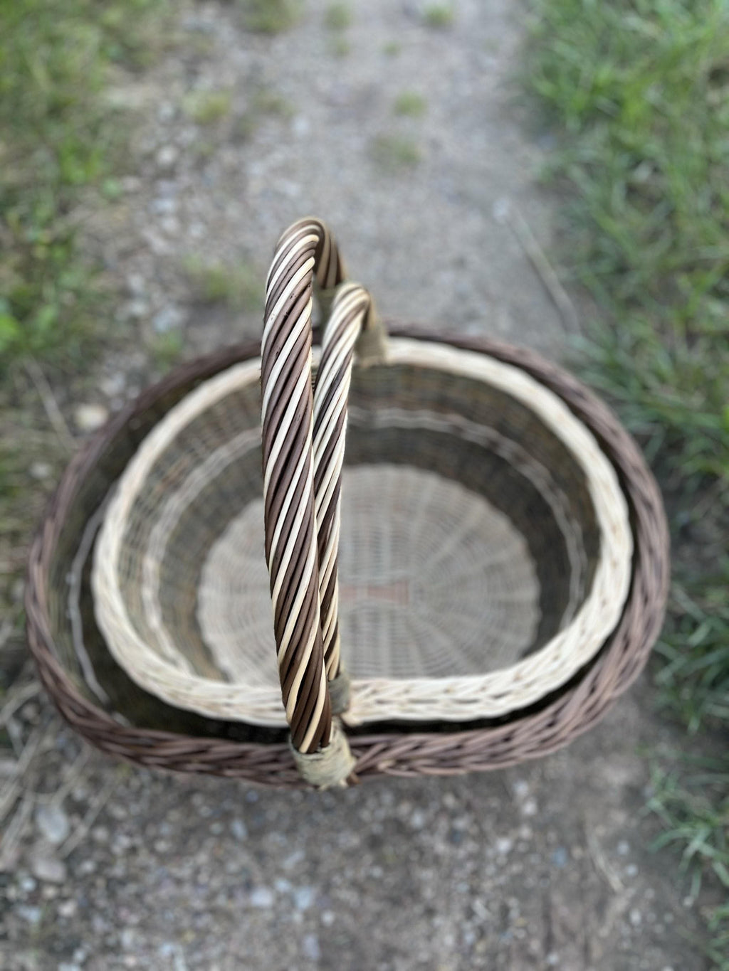 Top view of the nesting basket set showing the woven bases and the plaited rims