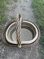 Top view of the nesting basket set showing the woven bases and the plaited rims