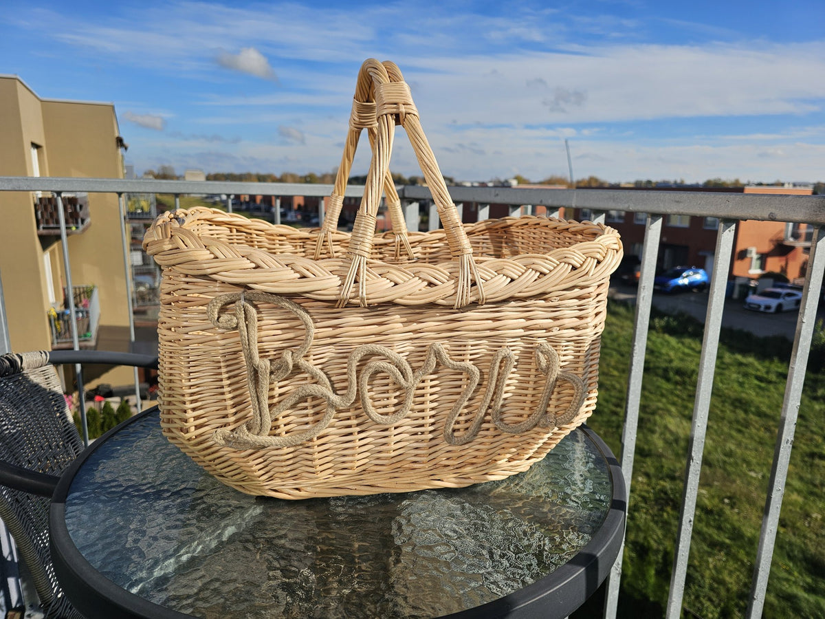 Handwoven willow basket with the name Boris shaped from rope with a wire core