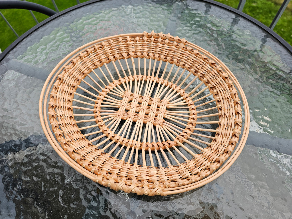 Oval lace-weave willow tray with a small lattice centre and wide open border, top view