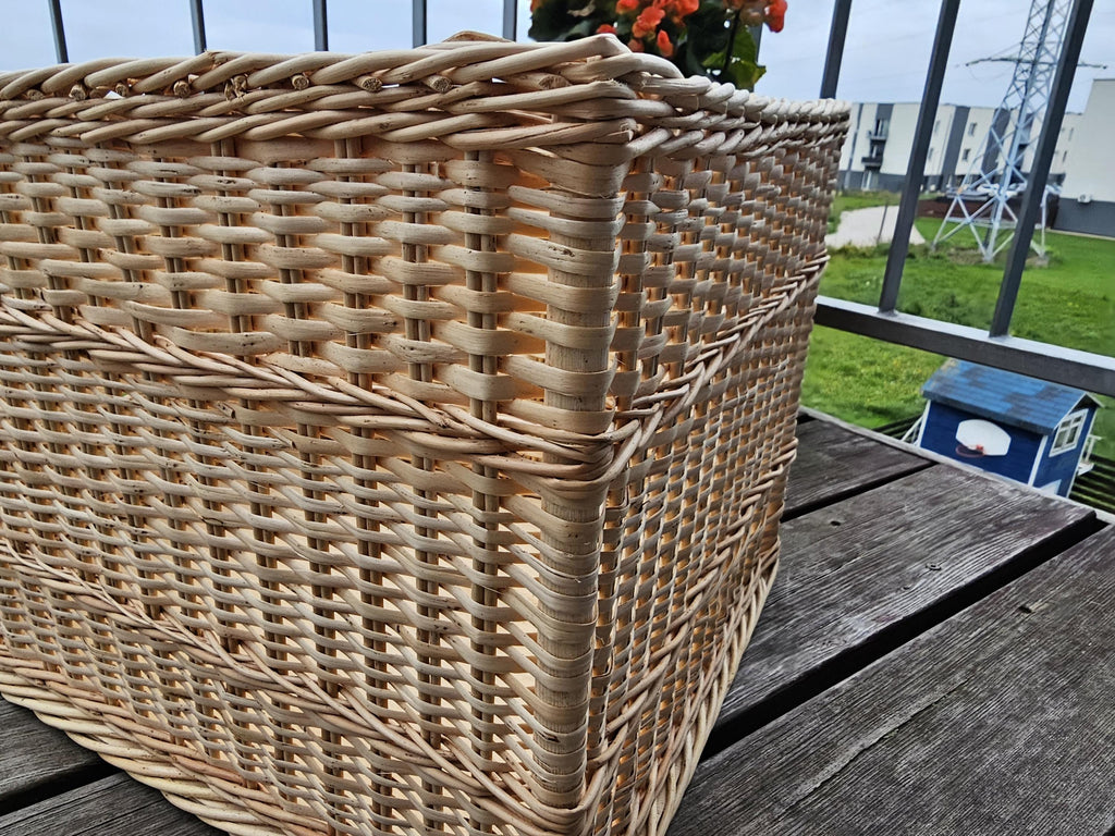 Close-up of the willow weave and raised woven band on the side of the storage basket